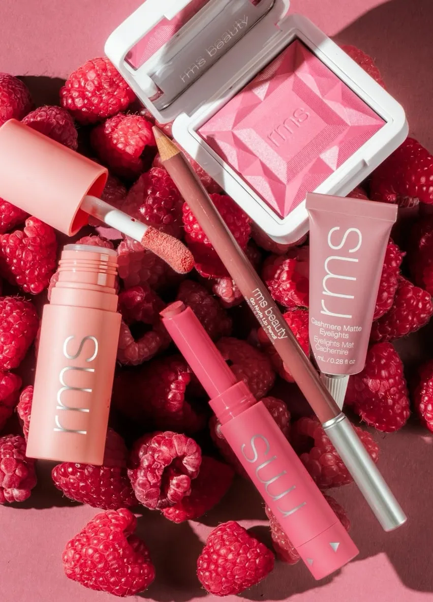 RMS Beauty lip products among raspberries